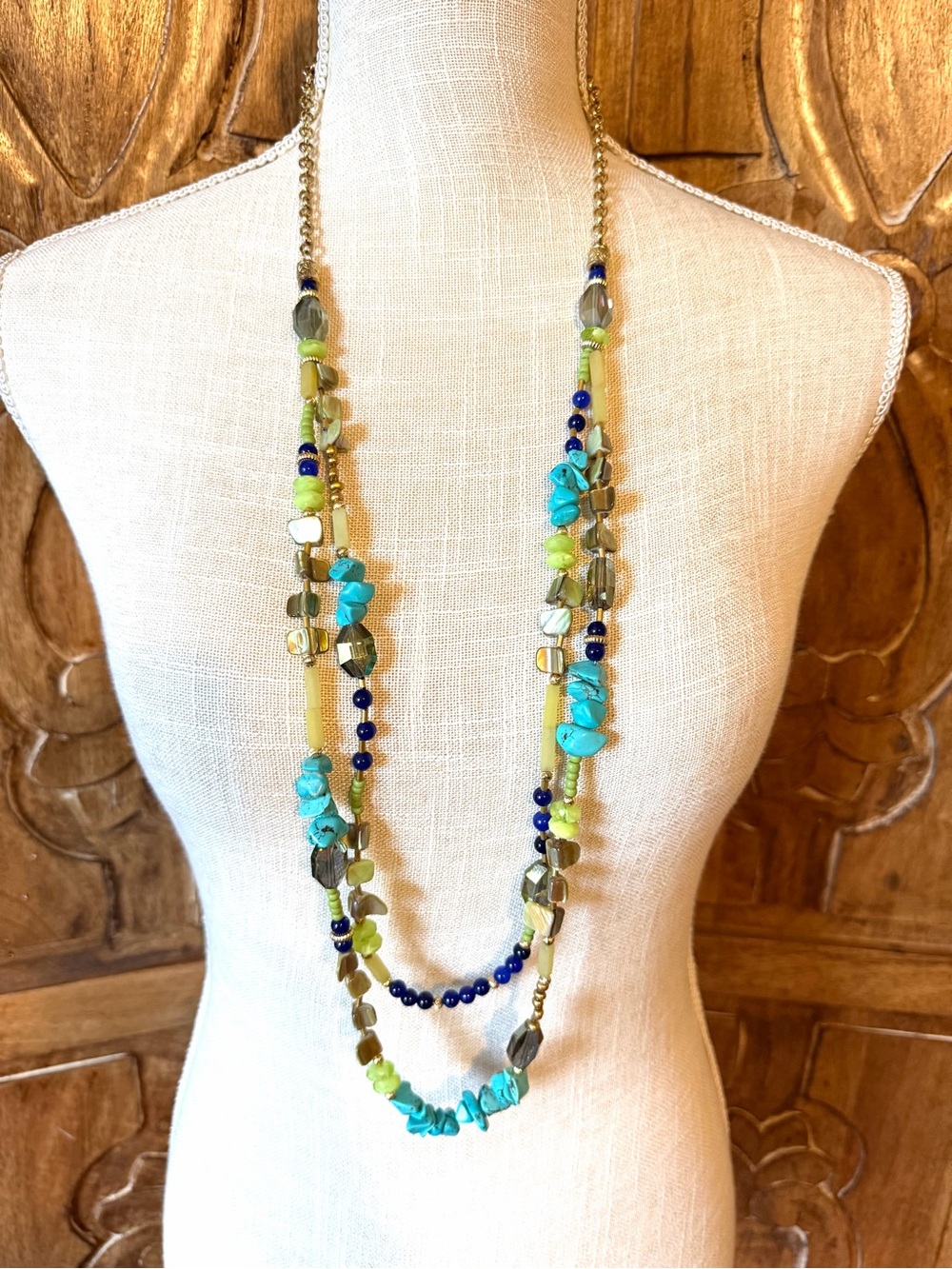 Chico’s long faux turquoise beaded necklace.